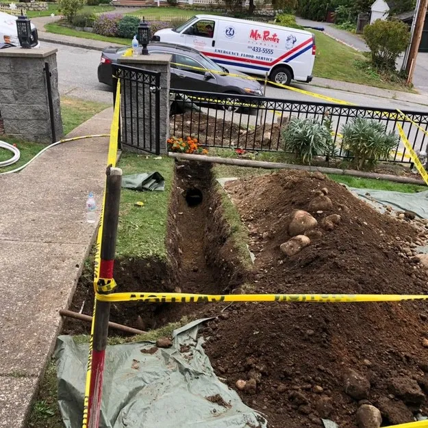 Sewer line repair performed on property of New Westminster homeowner by Mr. Rooter Plumbing