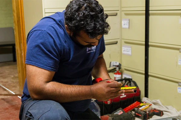 Mr. Rooter technician at work.