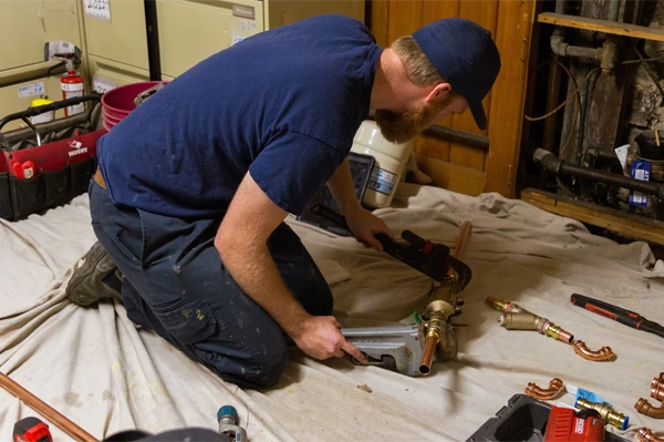 Mr. Rooter apprentice at work.