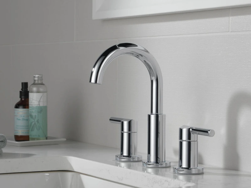 Double handled chrome faucet.