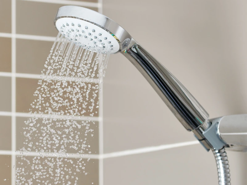 shower head with chrome finish.